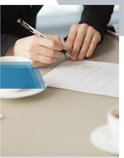 Business owner signing a trademark application