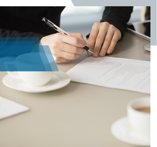 Business owner signing a trademark application