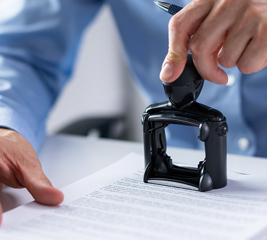 Hand stamping an official trademark document