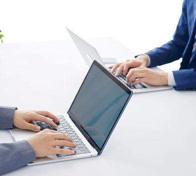 Person typing on a laptop to register a copyright online – Copyright registration in Chile